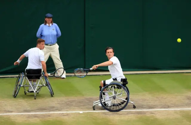 Alfie and Gordon at the baseline