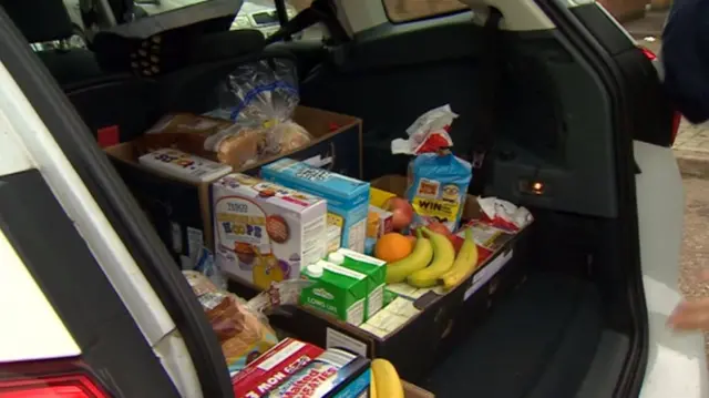 Food parcels in a car