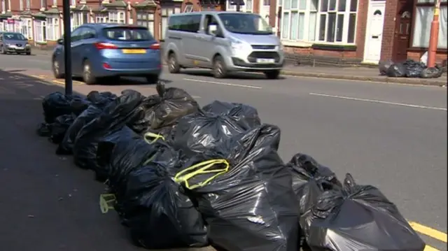 Bin bags left on a street in Birmingham