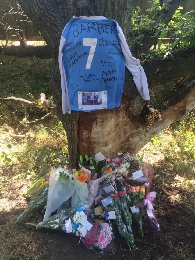 Flowers left at the scene of the crash