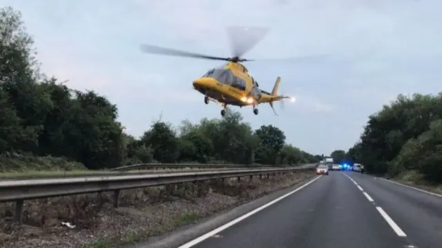 Air ambulance at the scene of the crash