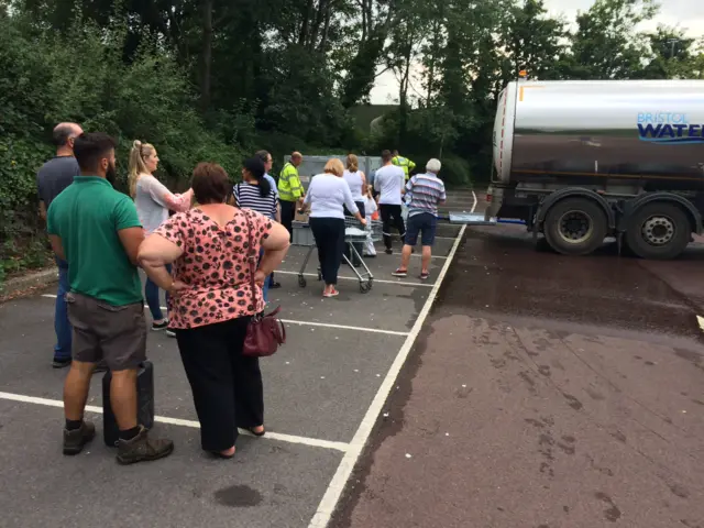 People collecting water