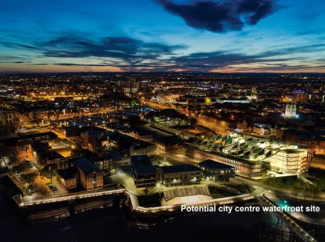 An artists impression of Hull's riverside with a big new building in it