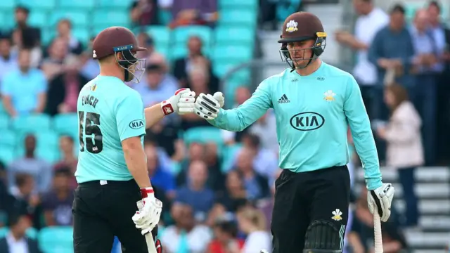 Surrey batsmen Finch and Roy