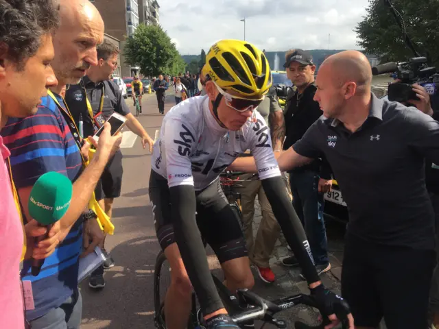 Chris Froome arrives at team bus after stage two