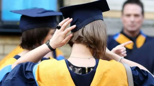 Students in degree hats