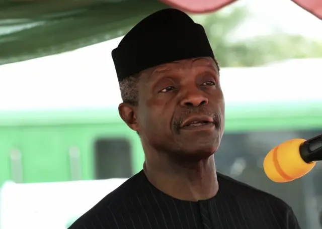 This file photo taken on March 7, 2017 shows Nigeria"s acting President Yemi Osinbajo speaking during the construction of the Lagos-Ibadan rail line project at the Ebute-Metta headquarters of the Nigerian Railway Corporation in Lagos