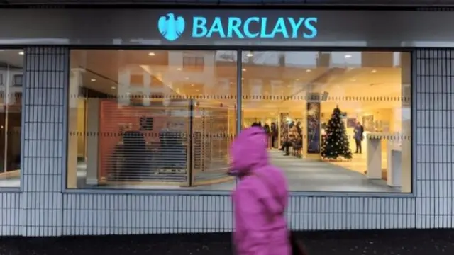 Customer going past a Barclays