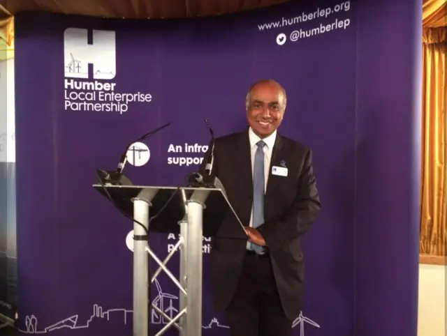 Kishor Taylor standing in front of a lecturn with a Humber LEP sign behind him.