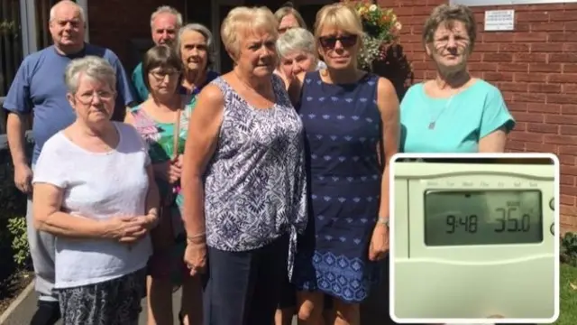 Front (left to right) Rita Williams, Violet West and Debbie Begg with some of the residents and their families at Oakendale. (Inset) a thermometer reading of one of the main stairwells