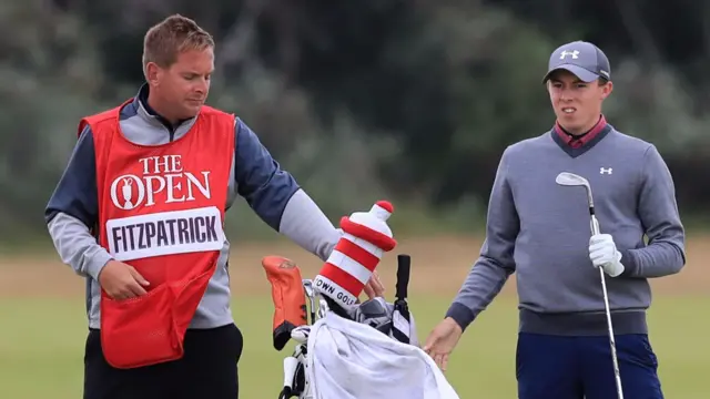 Matthew Fitzpatrick and his caddy