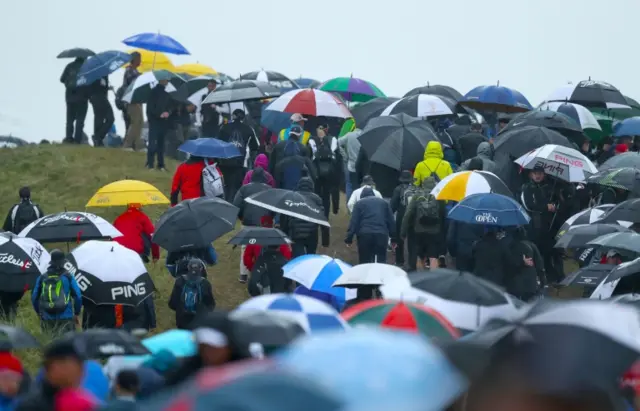 Fans in the rain at Royal Birkdale