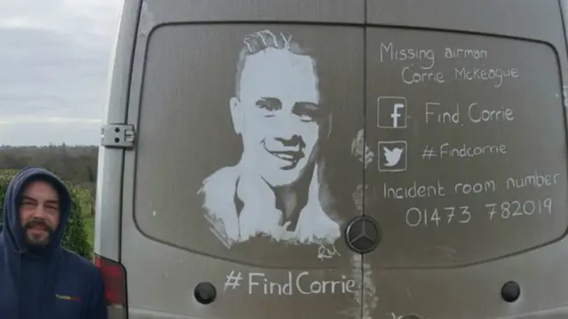 Image of Corrie on back of van