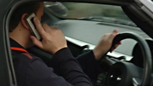 Driver using mobile phone