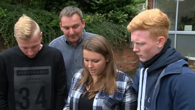 Rebecca Spruce with members of Barry Joy's family