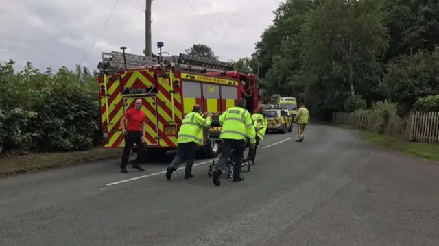 Man being rushed to air ambulance