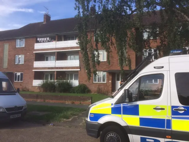 Police van and officer at the entrance to Maple House, Lake Avenue, Bury St Edmunds