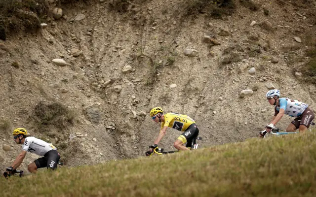 Team Sky ride in the peloton