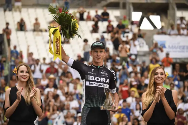 Maciej Bodnar celebrates on the podium