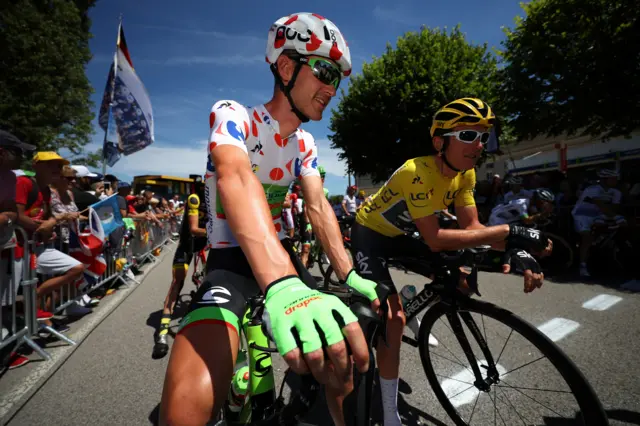 Nathan Brown of United States riding for Cannondale Drapac in the King of the Mountains Jersey, and Geraint Thomas of Great Britain riding for Team Sky in the leader"s jersey