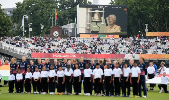 Eileen Ash appears on the big screen ringing the five minute bell at Lords