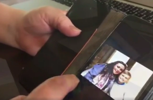 James O'Mara (left) on phone photograph