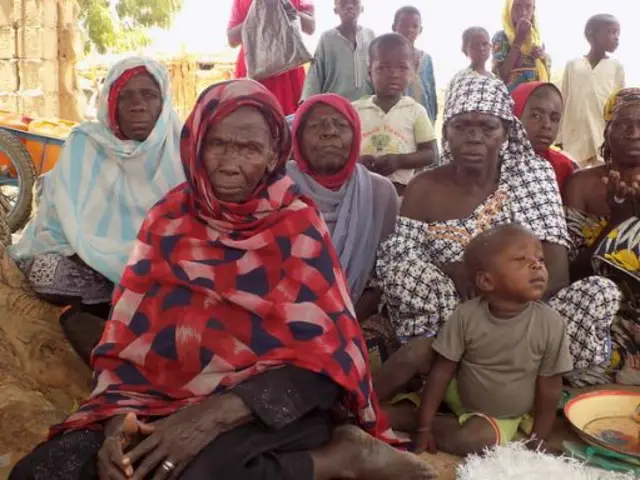 Female IDPs from Bama. Most have lost their husband to Boko Haram, and are left to fend for themselves in a different town, far from home. Nigeria.