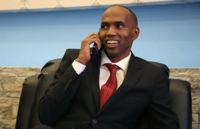 Somalia's newly appointed Prime Minister Hassan Ali Kheyre, also spelt Khaire, talks on the phone in Mogadishu on February 23, 2017.