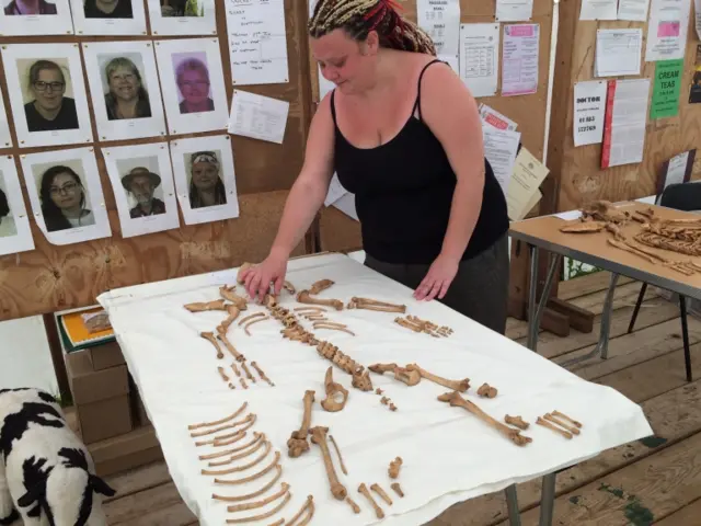 Virginia Woods with a dog skeleton