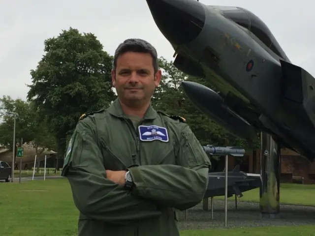 Gp Capt Davies stands by a Tornado plane