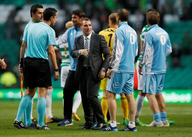 Celtic manager Brendan Rodgers shakes hands at full-time