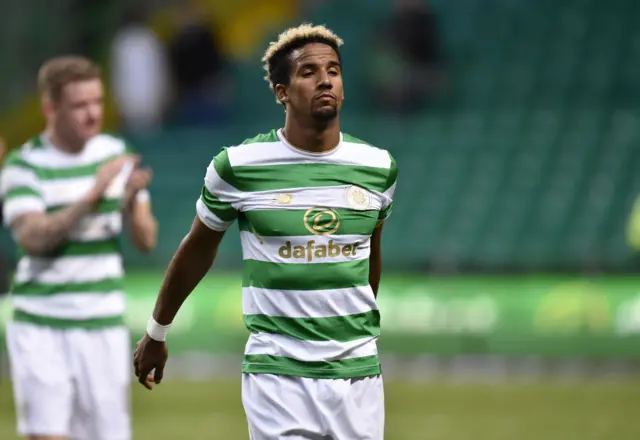 Celtic forward Scott Sinclair walks off the pitch following the draw against Rosenborg