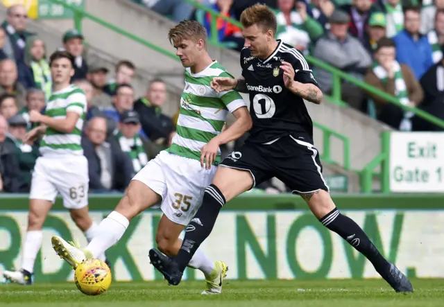 Celtic's Kristoffer Ajer (left) competes with Rosenborg's Nicklas Bendtner