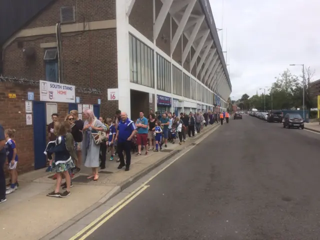 Autograph hunters queuing outside stadium