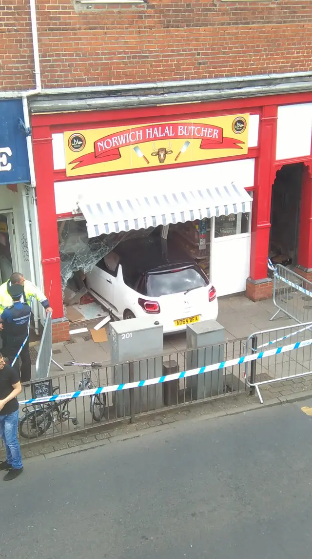 White car in the butcher's shop