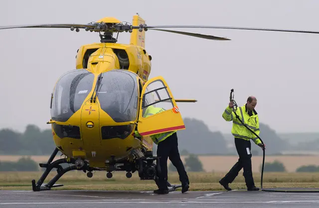 Prince William with a helicopter