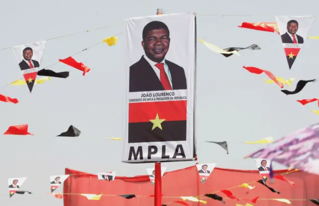 Banners bearing a picture of MPLA (The People's Movement for the Liberation of Angola) residential candidate Joao Lourenco during a rally in Luanda on March 4, 2017.