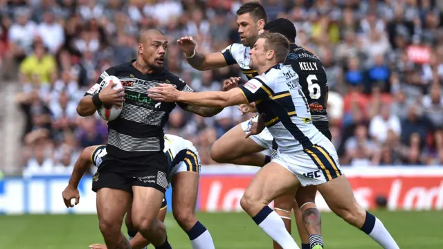 Hull FC's Sika Manu tackled by Leeds Rhinos' Jimmy Keinhorst