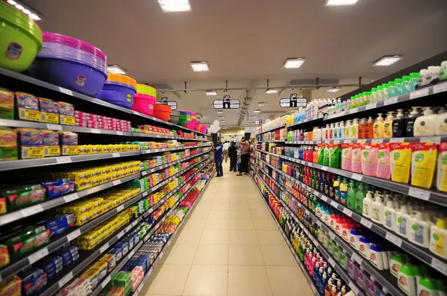 Shoppers look at products in the Nakumatt supermarket in Nairobi on June 8, 2015.