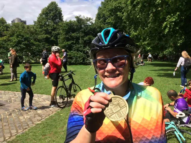 Anna Thompson and her RideLondon finishers medal