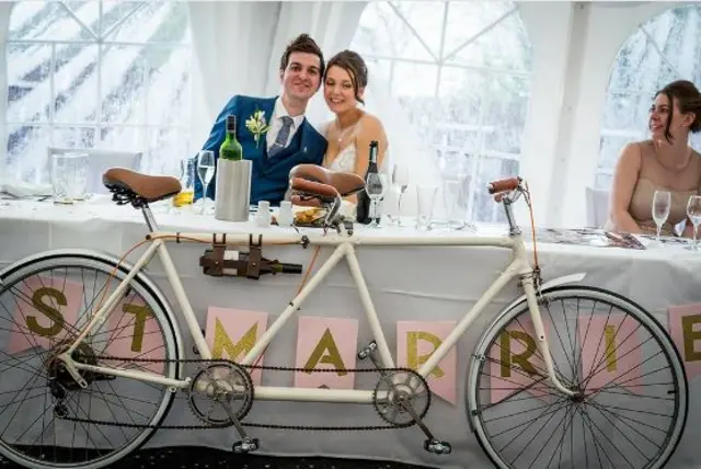 Wedding reception with a tandem bike