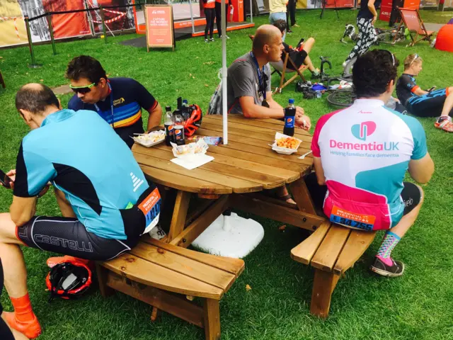 RideLondon finishers enjoying chips after finishing the ride