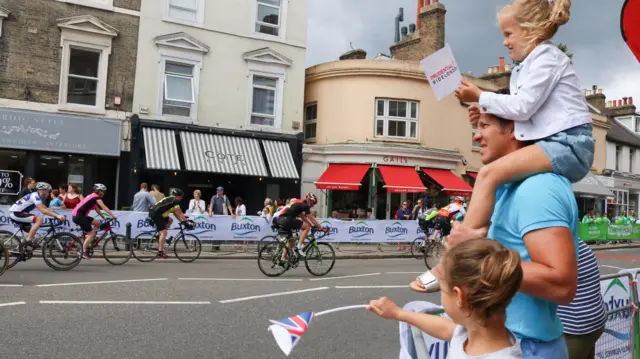 Supporters watching cyclist on the RideLondon route