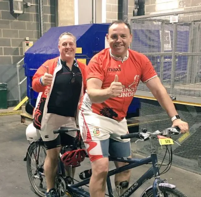 Former Ireland and Wasps rugby player Rob Henderson taking part in RideLondon on a tandem