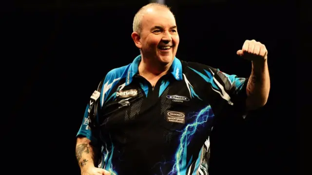 Phil Taylor celebrates