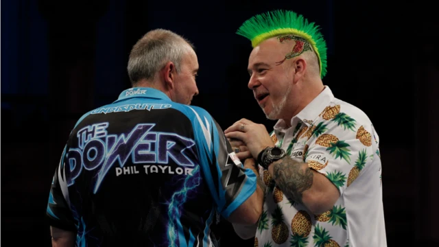 Phil Taylor and Peter Wright