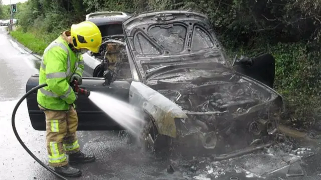 Firefighter tackling blaze