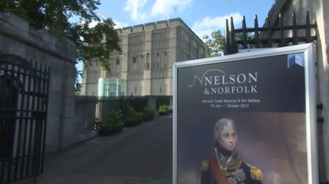 Norwich Castle Museum with poster advertising the Nelson and Norfolk display