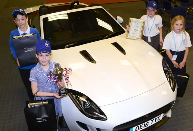 Charlie, Eryn, Frankie and Freya with the World Championship trophy