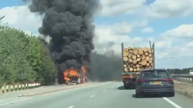 Double-decker bus on fire